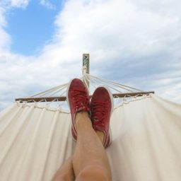 person's feet in a hammock
