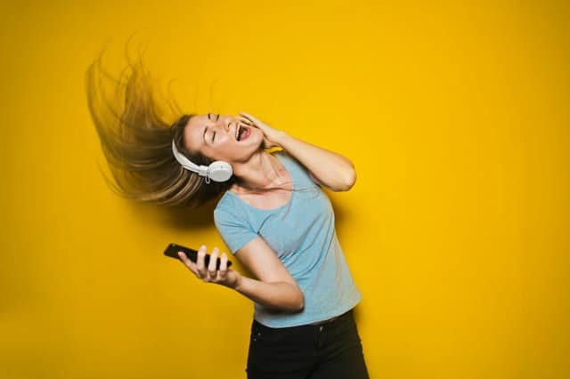 Girl listening to headphones 