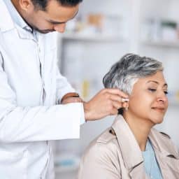 Woman in a hearing aid appointment