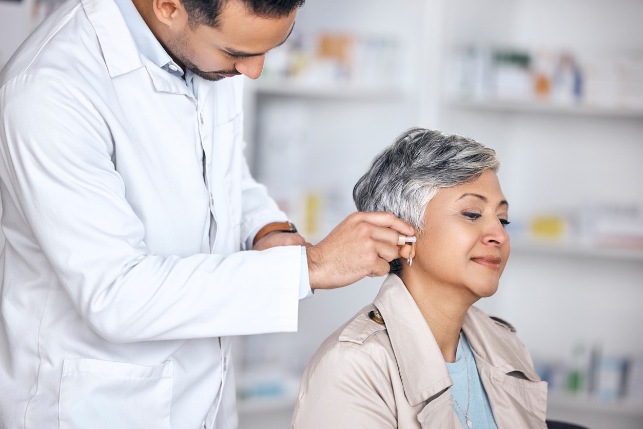 Woman in a hearing aid appointment.