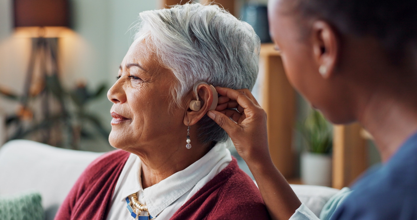 Woman gets hearing aid placed